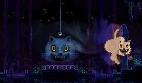 Two menacing cats glaring at the screen.