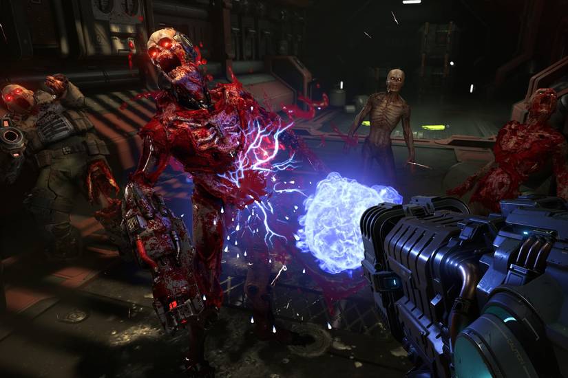 Screenshot of DOOM Eternal showing the player blasting away at an enemy 