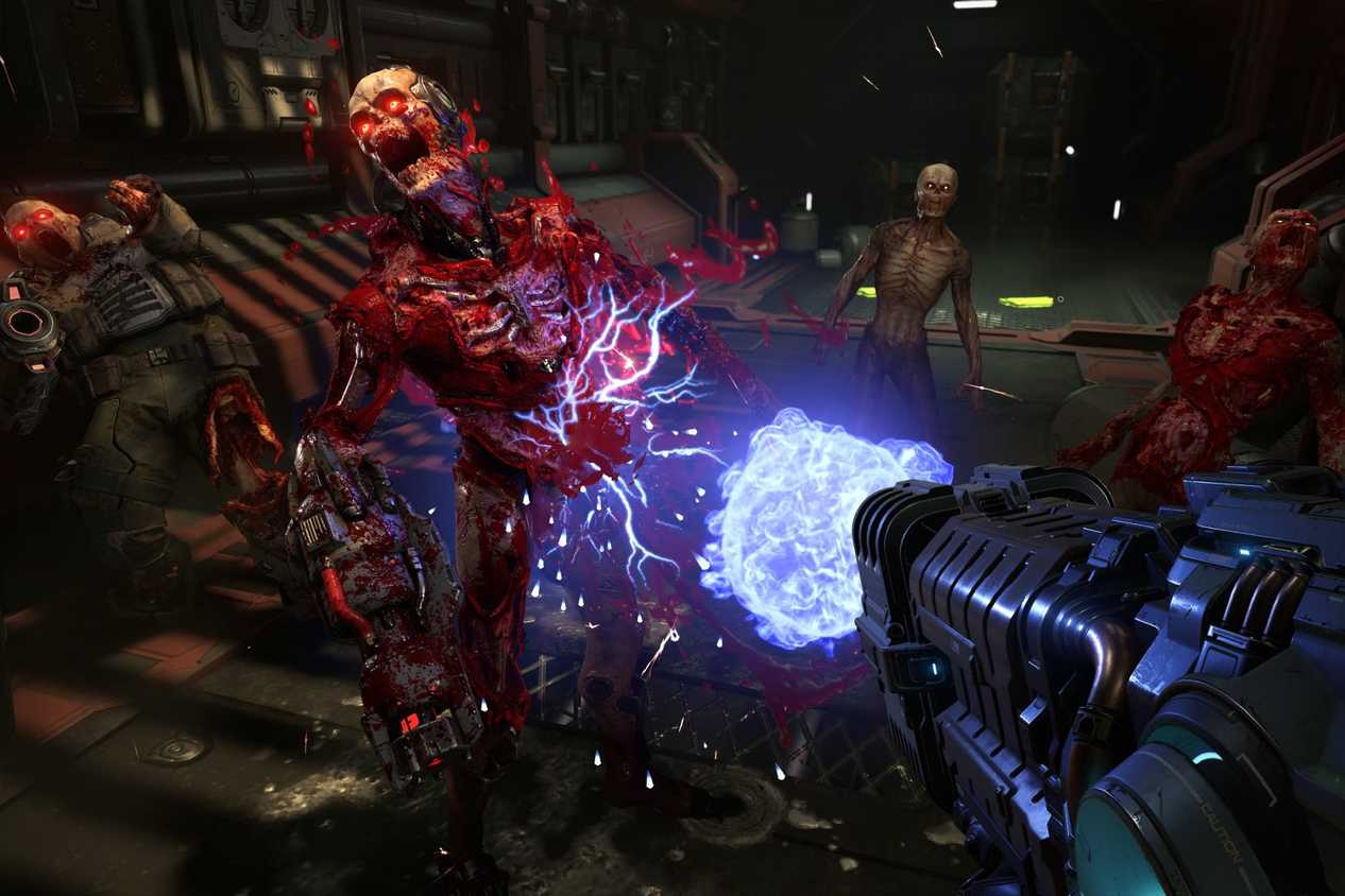 Screenshot of DOOM Eternal showing the player blasting away at an enemy