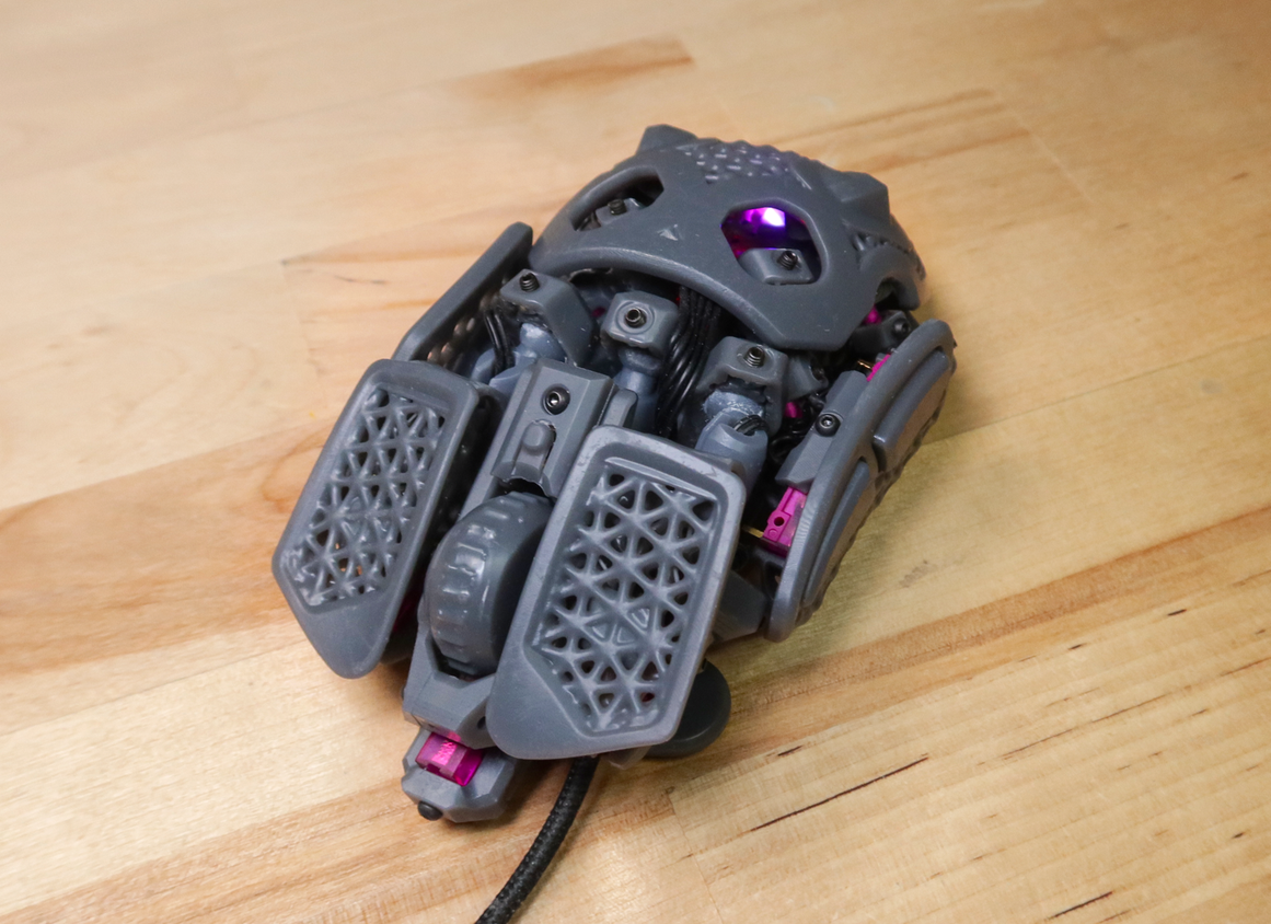 The Statial.b mouse in its standard configuration, with the internal LED visible