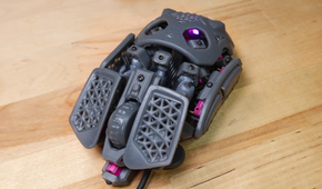 The Statial.b mouse in its standard configuration, with the internal LED visible