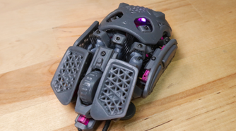The Statial.b mouse in its standard configuration, with the internal LED visible