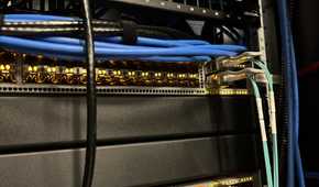 Image of a network switch with well managed cables.