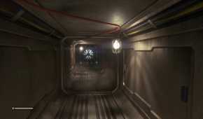 A dark, dimly lit crawl space in Alien Isolation
