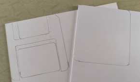 Outlines of floppy disk stenciled on foam board