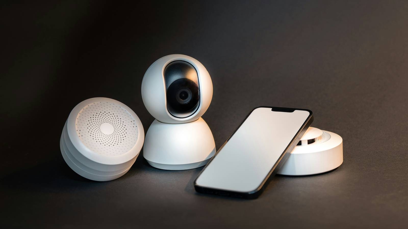 Several devices including a smartphone, webcam