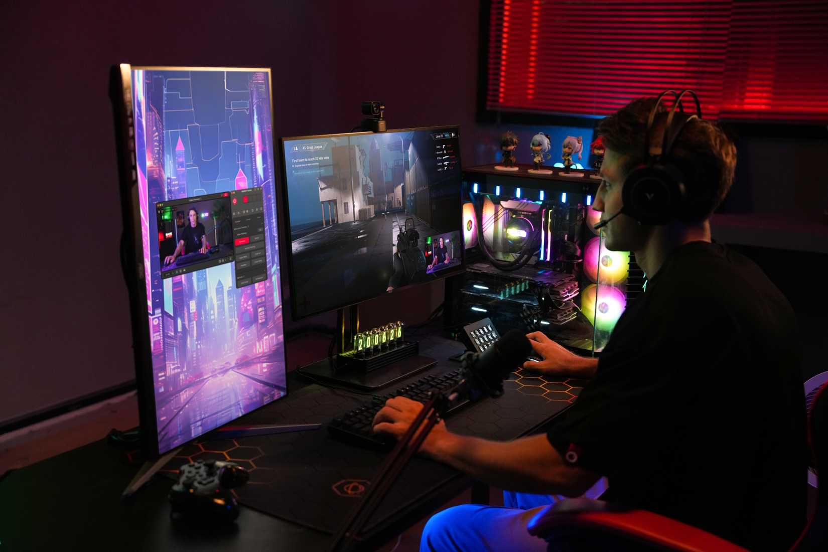Man gaming at desk with OSBOT Tiny 2 Lite on monitor
