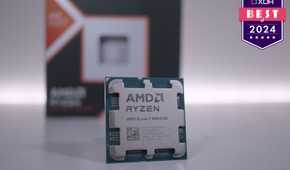 AMD Ryzen 7 9800X3D on a white surface with a badge reading XDA Best of 2024