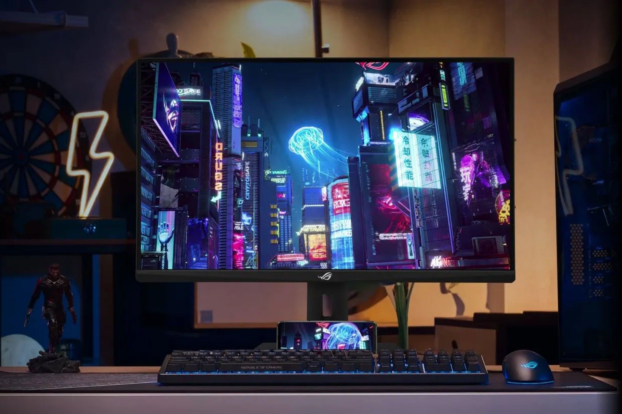 asus rog strix xg27ucg dual-mode ips monitor on a desk with peripherals