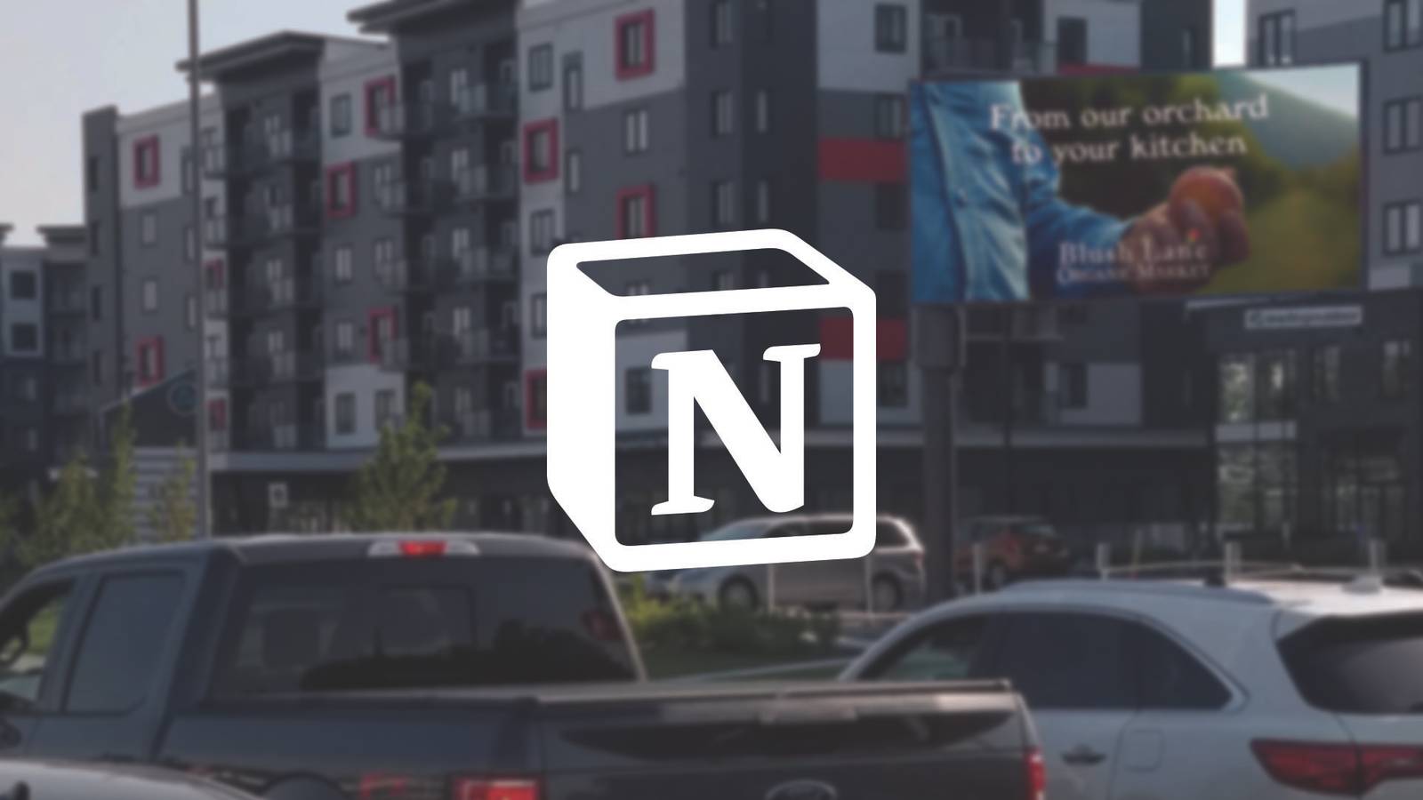 The notion logo on an image depicting a billboard and car traffic