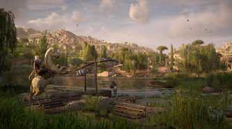 Bayek on horseback looking at the nile in a green area