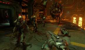 Screenshot from DOOM (2016) video game of demonic enemies closing in on player character with shotgun