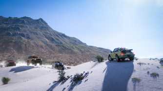 Screenshot from Forza Horizon 5 video game of cars parked at the top of a snowy mountain