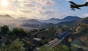 Screenshot from video game Grand Theft Auto V of biplane flying over tropical coastline