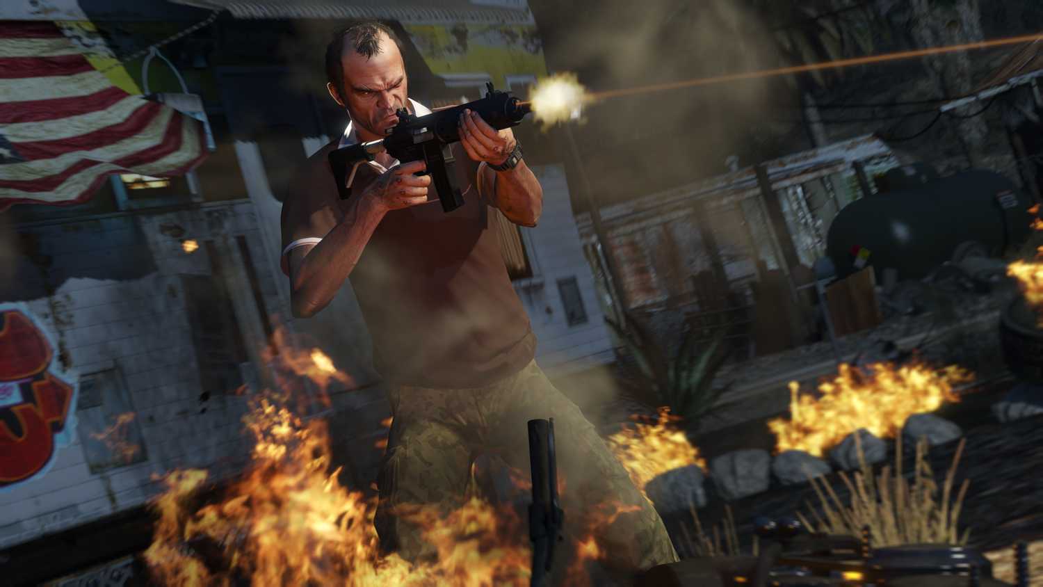 Screenshot from Grand Theft Auto V video game of man shooting assault rifle with flames around him