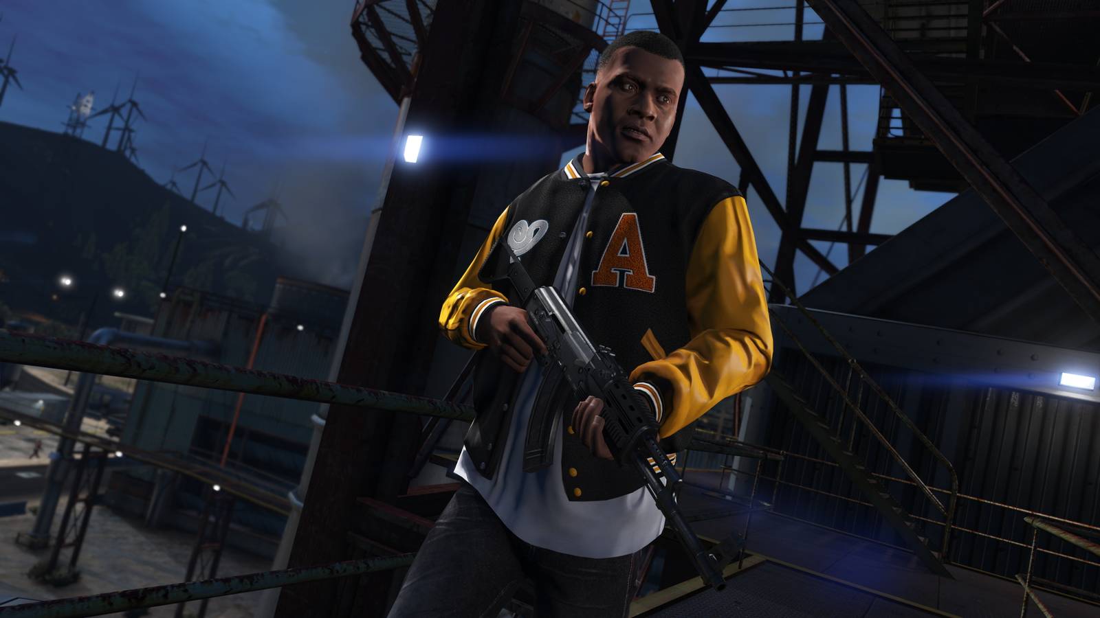 A man in yellow sleeve jacket holding a gun at night