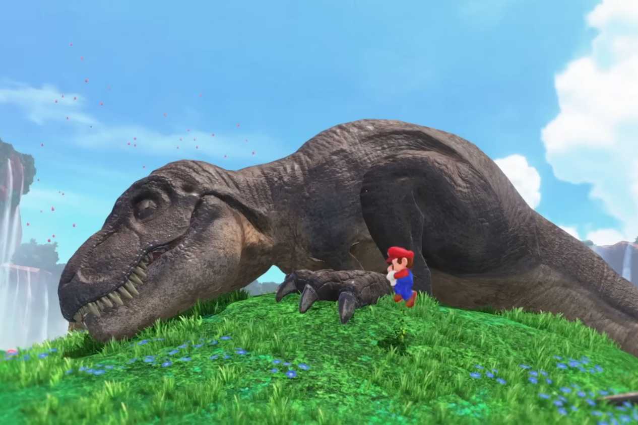 Super Mario Odyssey Mario standing next to T-Rex on hill