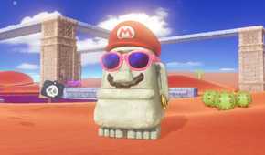 Super Mario Odyssey Mario hat and mustache on statue in the desert