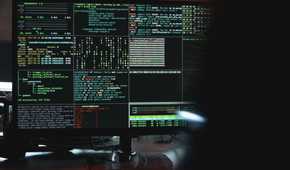 Close-Up View of System Hacking in a Monitor