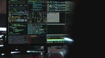 Close-Up View of System Hacking in a Monitor