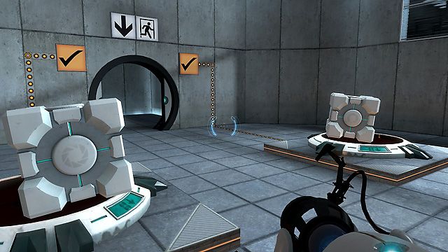 Screenshot of two cubes dropped on pressure switches to open a door in the video game Portal