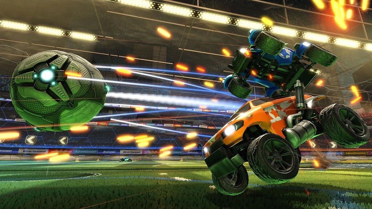 Screenshot from Rocket League video game of two cars propelling towards large metal ball