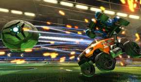Screenshot from Rocket League video game of two cars propelling towards large metal ball