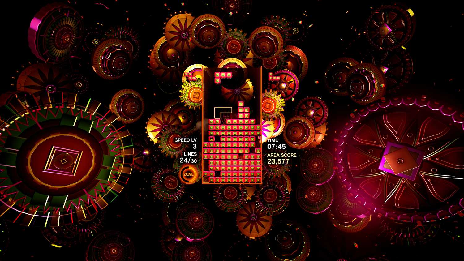 Screenshot from Tetris Effect video game of Tetris board surrounded by brightly coloured rings