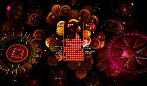 Screenshot from Tetris Effect video game of Tetris board surrounded by brightly coloured rings