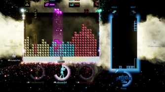 Screenshot from Tetris Effect video game of one large Tetris board and on smaller Tetris board
