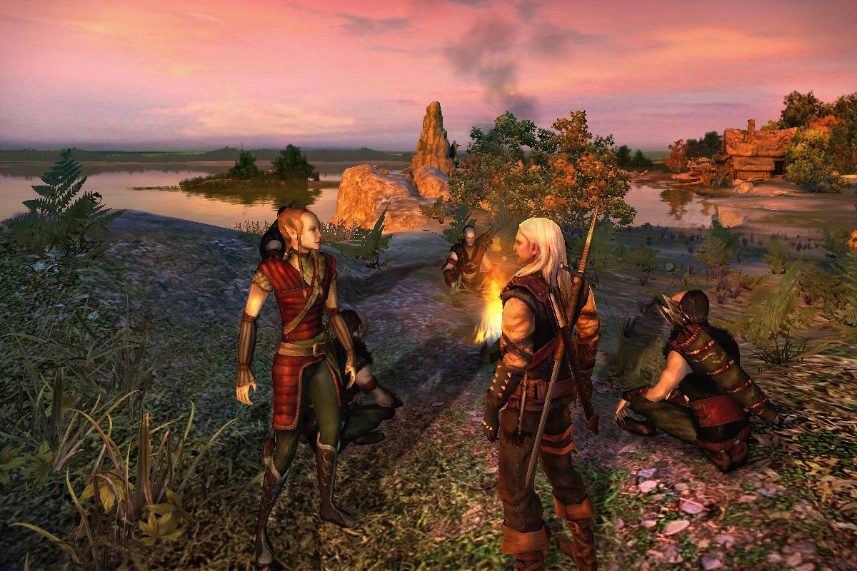 Screenshot from the video game The Witcher, showing Geralt speaking to someone near a fire