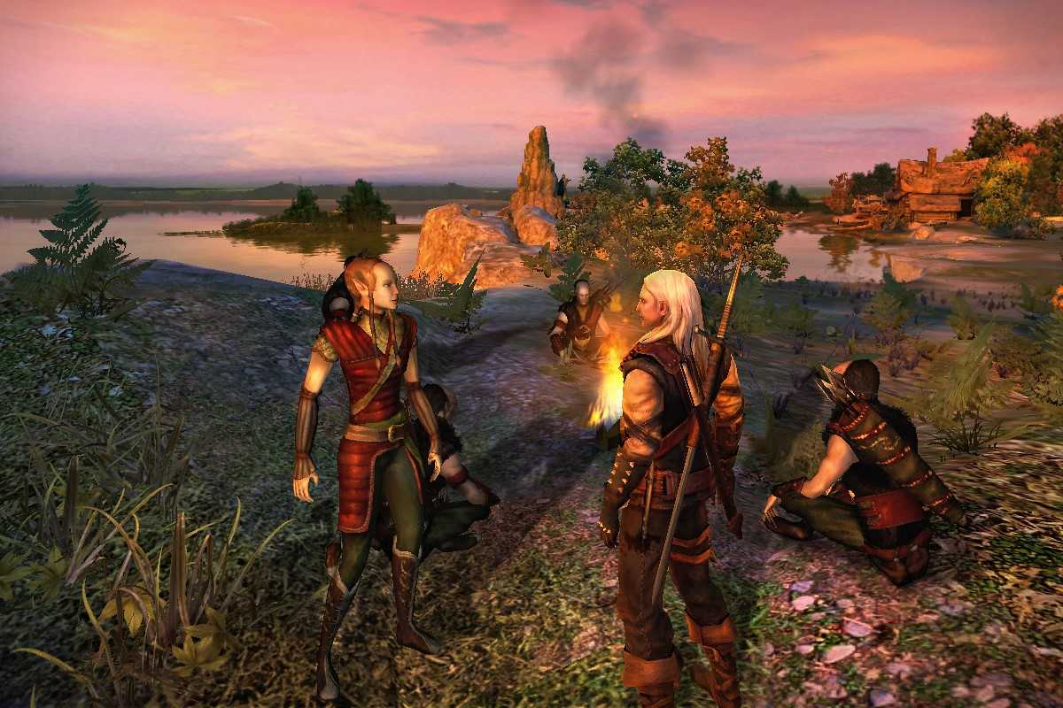 Screenshot from the video game The Witcher, showing Geralt speaking to someone near a fire