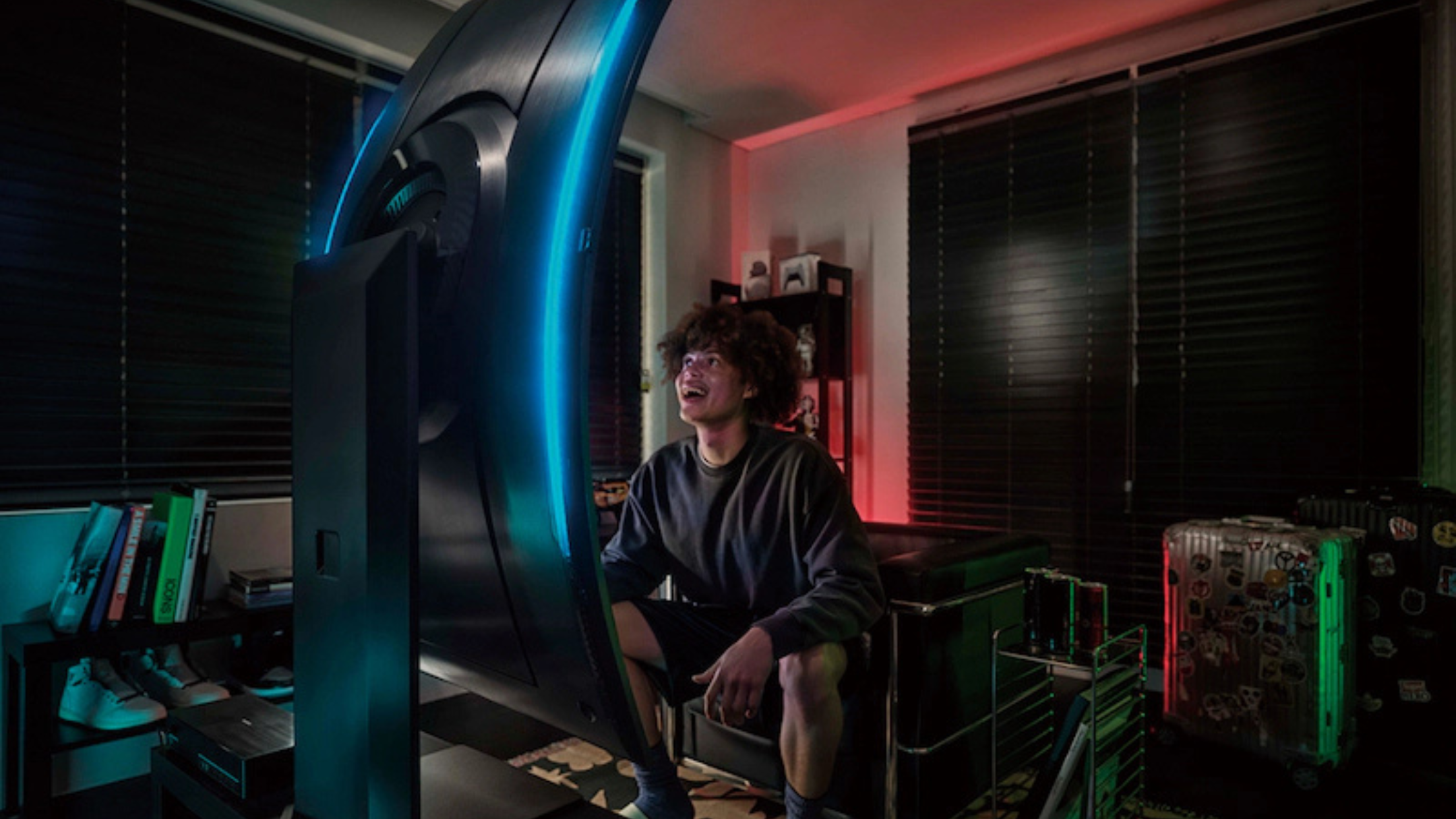 Person looking at Samsung 55" Odyssey Ark 2nd Gen. Curved 4K UHD Quantum Mini-LED monitor