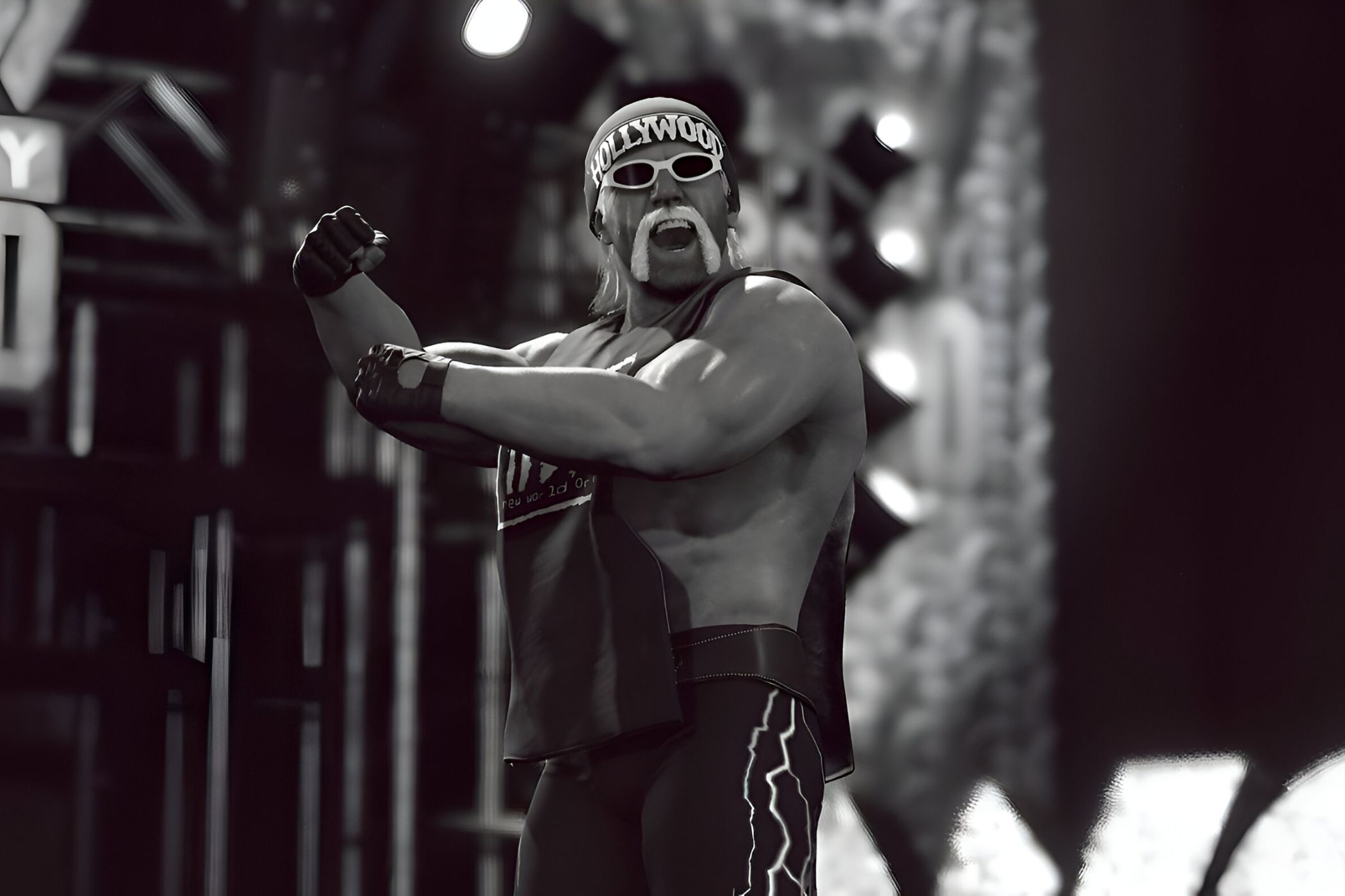 A screenshot from WWE 2K23, showing Hollywood Hulk Hogan, sporting a bandanna and goggles, make his entrance to the ring while flexing his arms.
