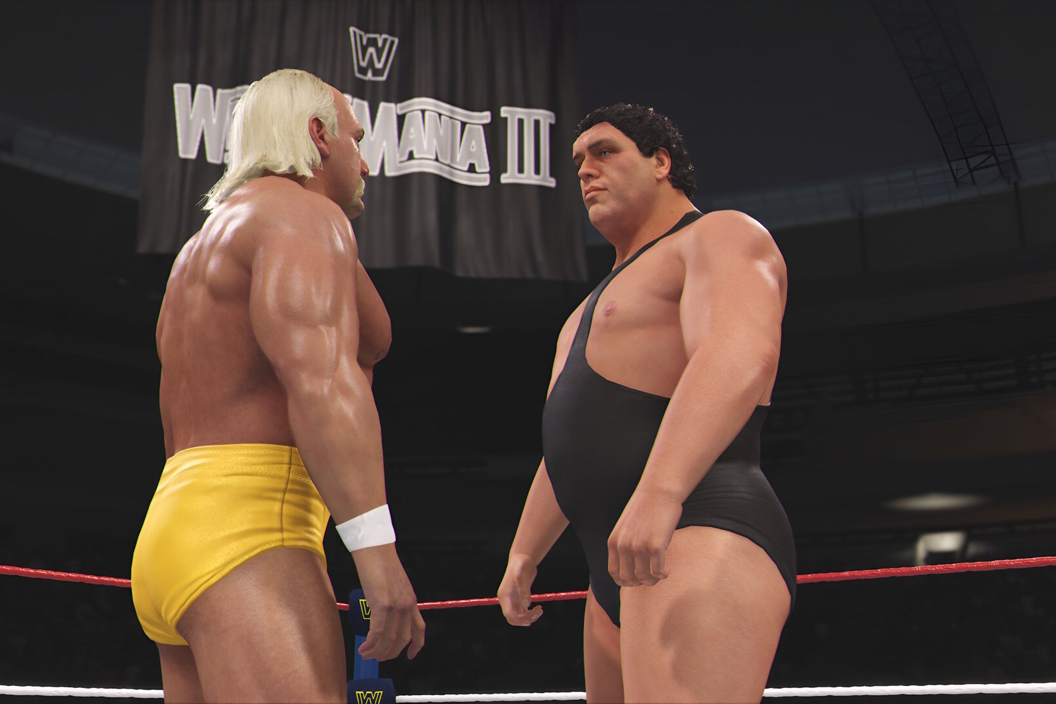 A screenshot from WWE 2K24, showing Hulk Hogan in yellow tights, face off against Andre The Giant, wearing a black singlet, at Wrestlemania III.