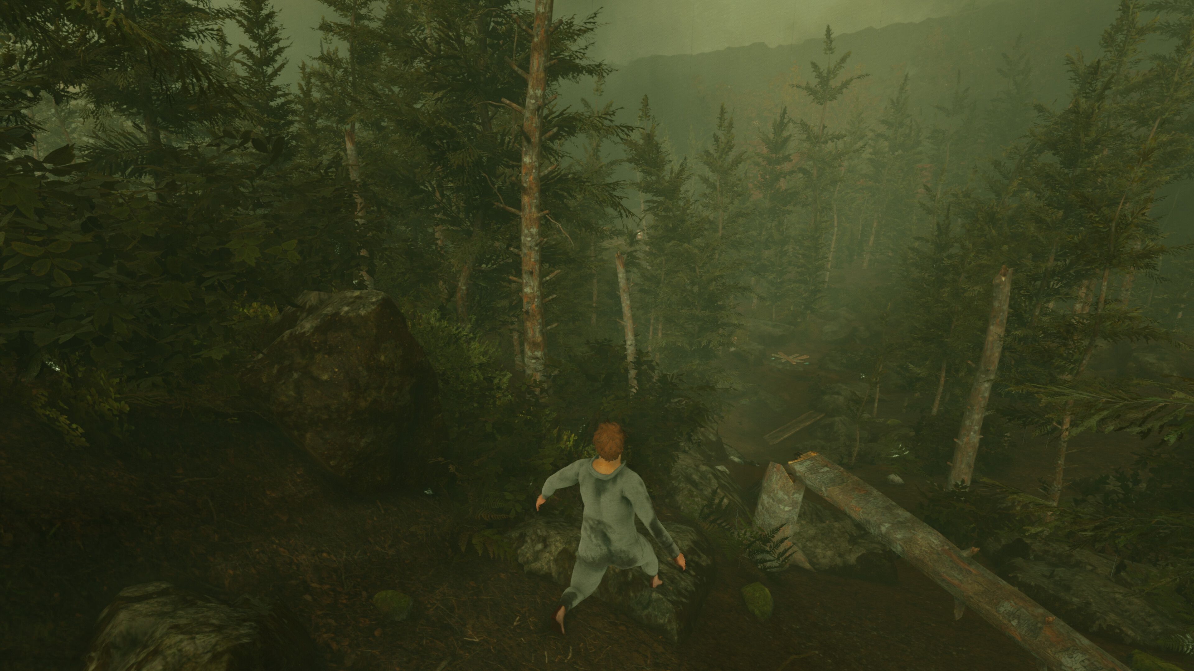 Screenshot from Baby Steps video game of man walking through forest. 