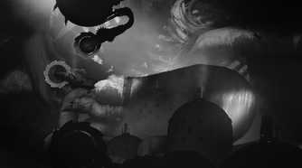Screenshot from Bionic Bay video game of man walking on metal surface with giant sawblades behind him.