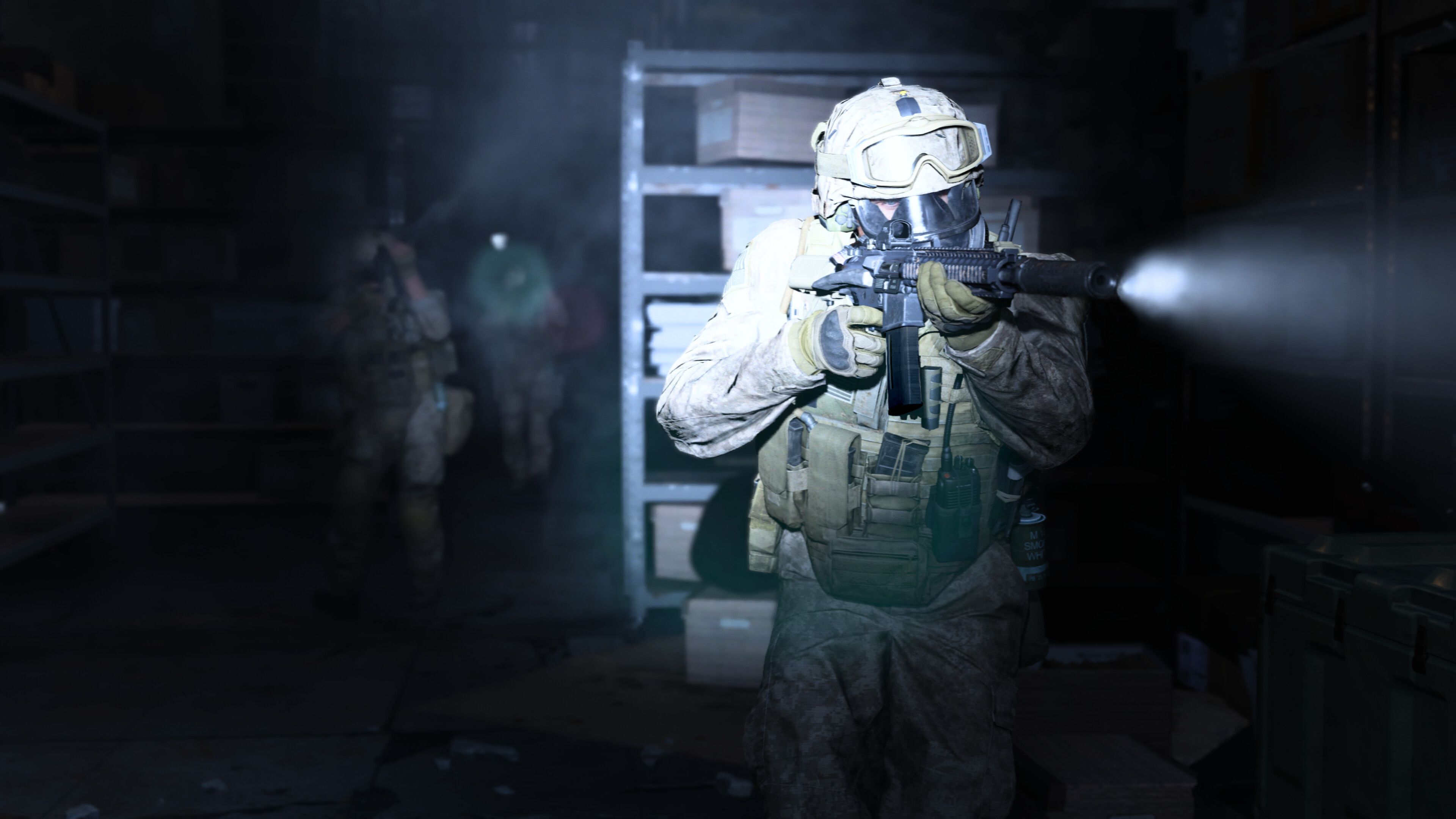 Screenshot from Call of Duty: Modern Warfare (2019) video game of armed soldiers walking through a dark room with flashlights