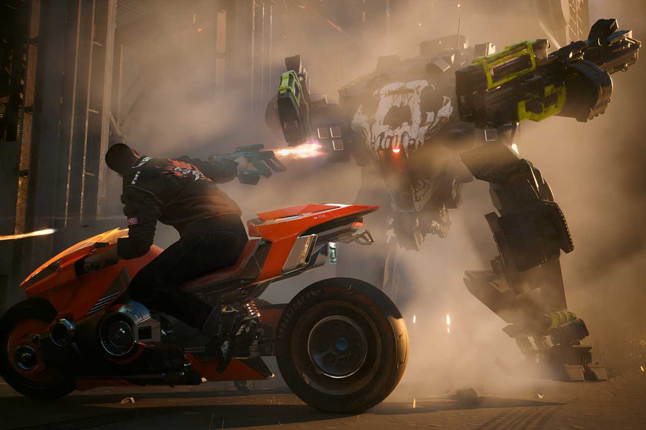A screenshot from Cyberpunk 2077: Phantom Liberty, showing the protagonist, V, ride by a giant mech on a motorcycle while shooting at it.