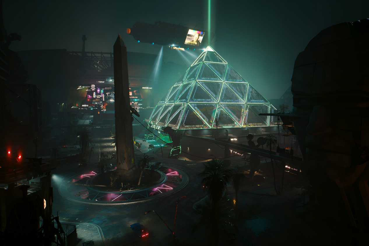 A screenshot from Cyberpunk 2077: Phantom Liberty, showing Dogtown, a location in the game with a giant glowing pyramid in it