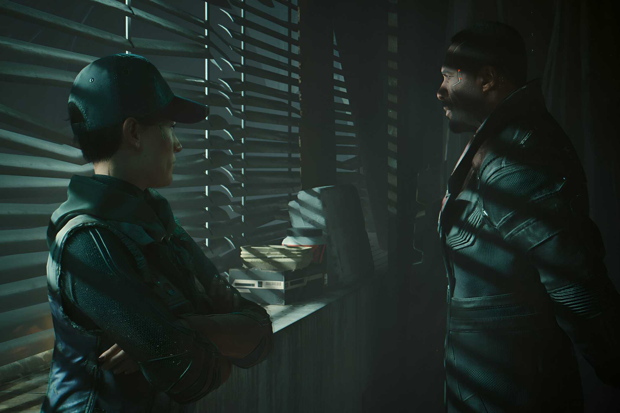 A screenshot from Cyberpunk 2077: Phantom Liberty, showing two characters shrouded in darkness as they stand next to a window.