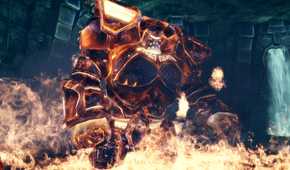 A screenshot from the game Dragon Age: Origins, showing a huge creature wearing metal armor sitting in fire.