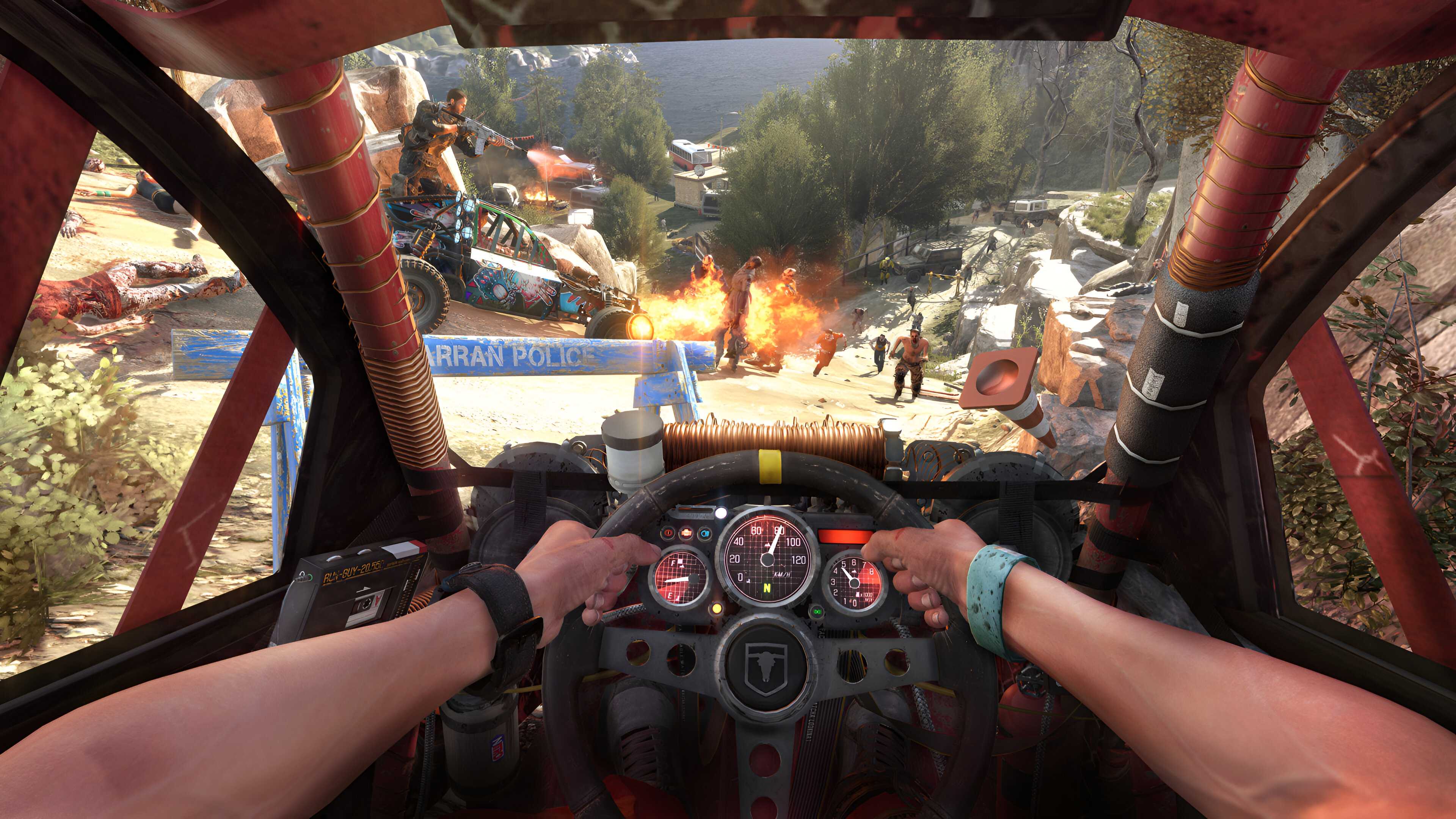 A screenshot from Dying Light: The Following, showing a first-person view of driving a buggy while another character in a different buggy shoots zombies.