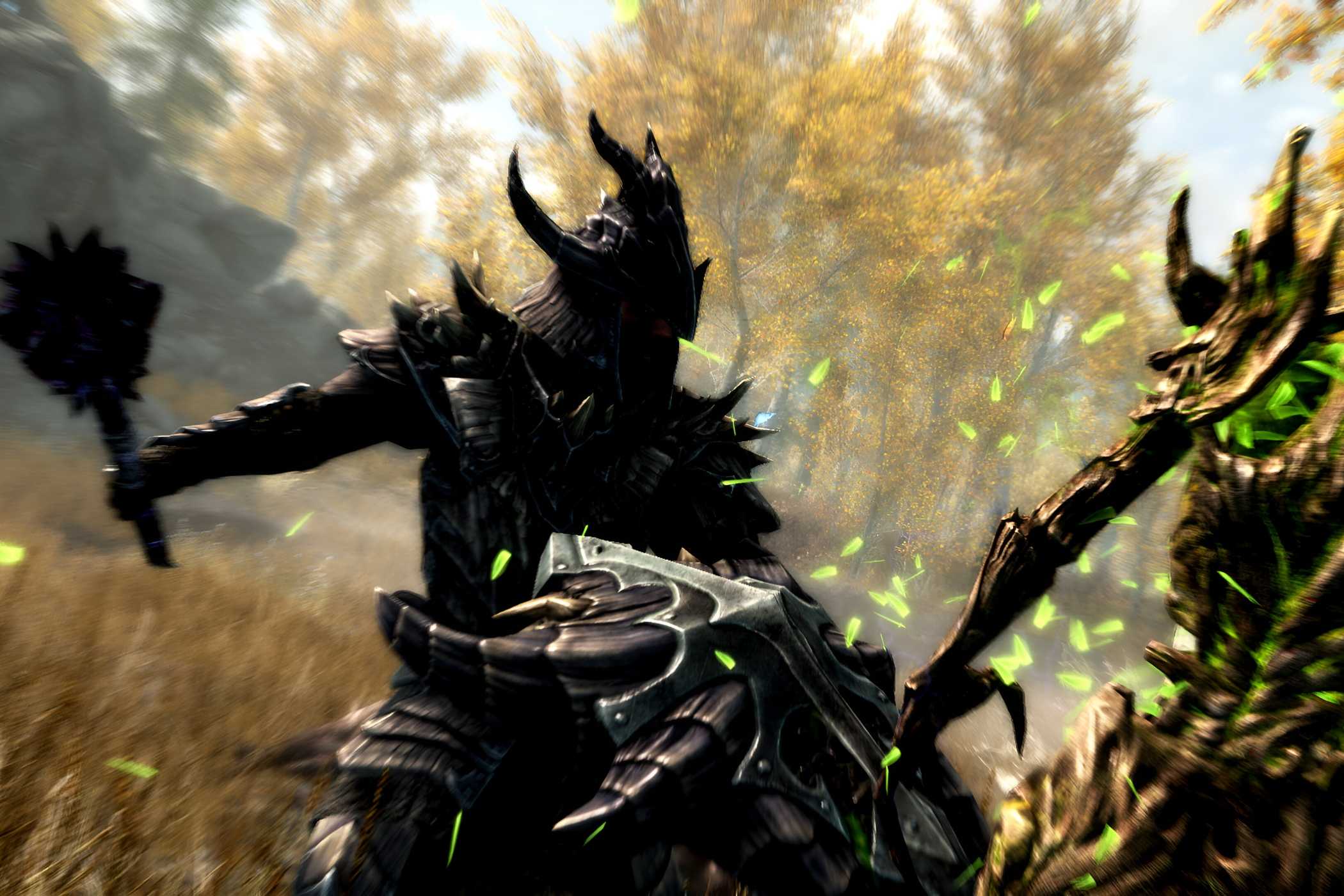 A screenshot from the game The Elder Scrolls V: Skyrim, showing a character in black armor weild a mace and shield to fight off a wooden, organic foe.