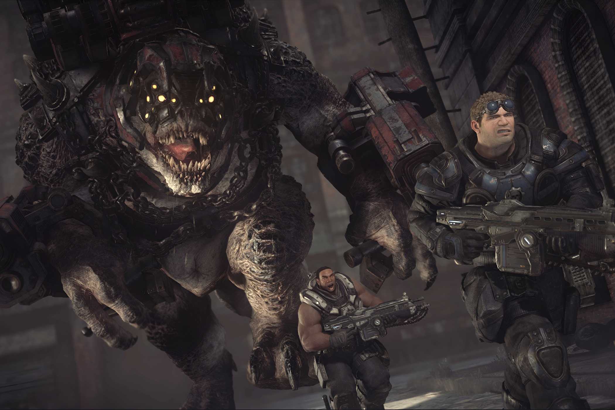 A screenshot from the game Gears of War: Ultimate Edition, showing two men in big, bulky armor, running away from a huge bi-pedal lizard wearing red armor and chains.