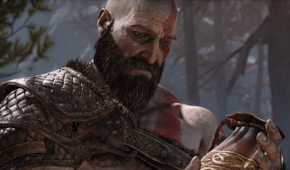 Kratos, a Greek God with white skin, red tattoos and a thick beard, wearily looking at a leather pouch he is holding.