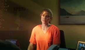 Image from Grand Theft Auto VI video game of female character in prison jumpsuit sitting in an office.