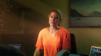 Image from Grand Theft Auto VI video game of female character in prison jumpsuit sitting in an office.