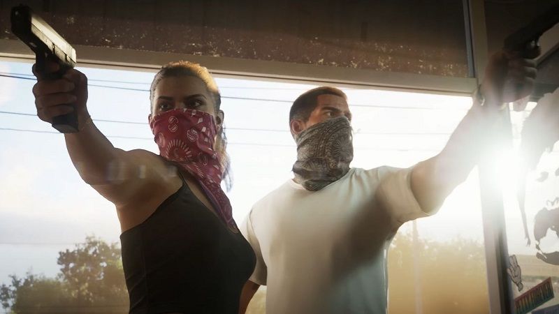 Image from Grand Theft Auto VI video game of a female and male character with masks over their mouths entering a room with pistols drawn.