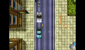 Top-down view of the player standing in the middle of the road between a cyan car, a classic convertible, and a bike